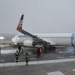 Vyprošťování Boeingu 737-800 v polských Katowicích VODOZNAK 13.03.2013
