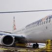 Vyprošťování Boeingu 737-800 v polských Katowicích VODOZNAK 13.03.2013